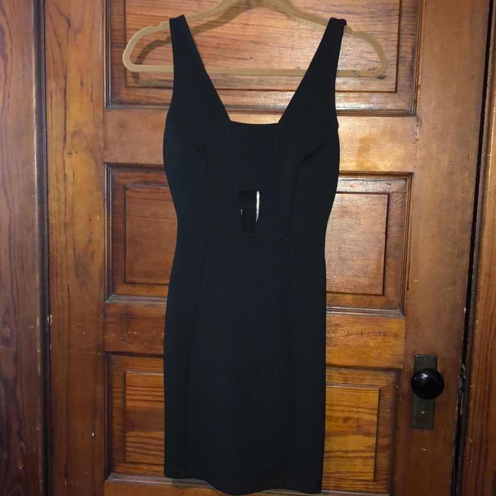 Black mini dress with open back and front